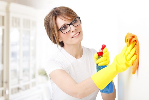 Office cleaning team working in a Clapham workplace reception area
