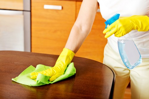 Local clearance crew organising room-by-room removal during a house clearance